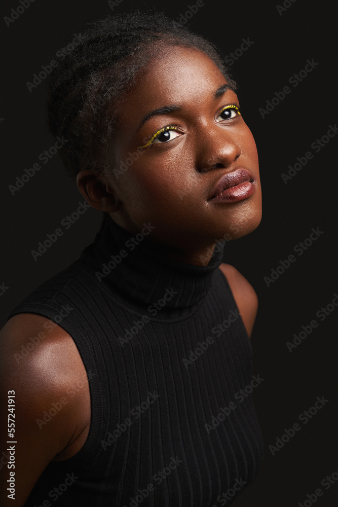 African American woman near black background African American woman near black background