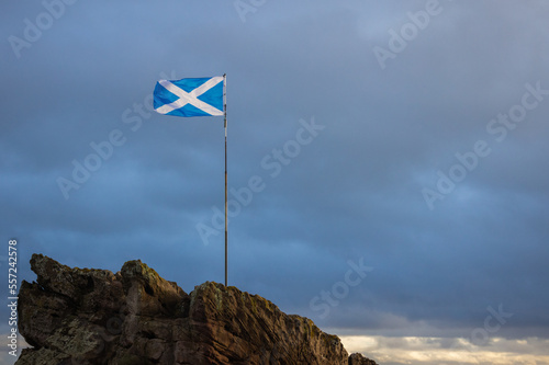 Saltire, Scottish Flag, Flying over a Rock photo