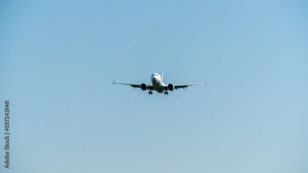 Fototapeta premium Airplane approaching landing, aircraft landing gear extended