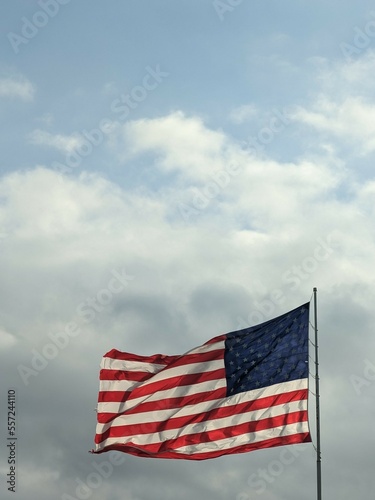 american flag against blue sky