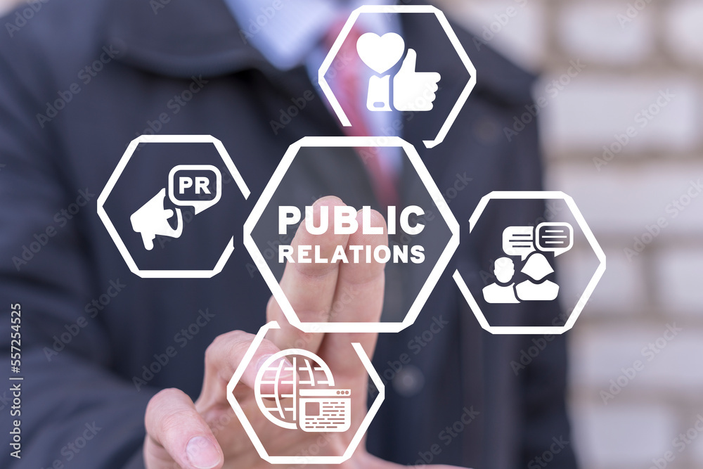 Businessman using virtual touchscreen presses inscription: PUBLIC RELATIONS. Concept of PR - Public Relations. PR, announcement, interview. Businessman using virtual touchscreen presses inscription: PUBLIC RELATIONS. Concept of PR - Public Relations. PR, announcement, interview.