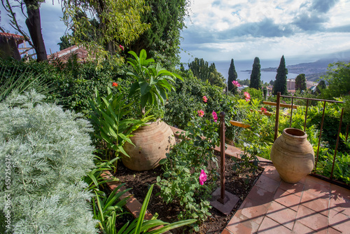 Amazing view in garden  Casa Cuseni in Taormina - and coastline of Mediterranean Sea (in direction Catania and Mount Etna) photo