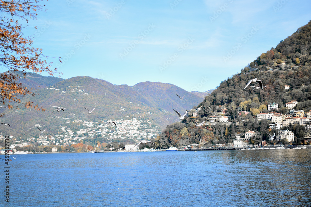 Lake of Como in winter with brownish mountains.