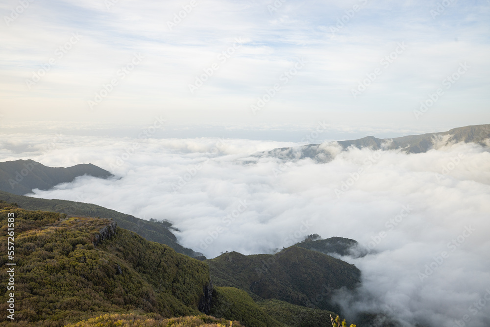 Big hill in Madeira called Bica da Cana surrounded by a breathtaking sea of ​​clouds.