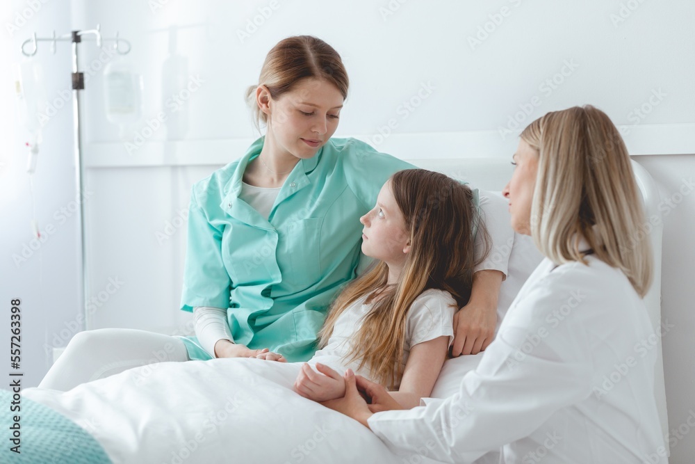 Hospital volunteer and a girl