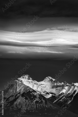 chinook clouds over snow-covered mountains