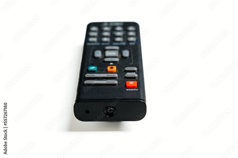 black remote control for home video projector on a white background. 