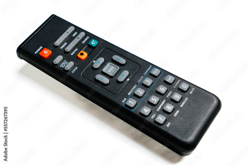 black remote control for home video projector on a white background. black remote control for home video projector on a white background.
