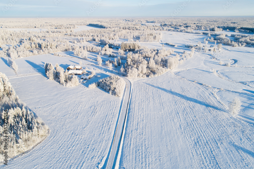 An aerial view of a frosty rural landscape on a winter day in Estonia, Northern Europe