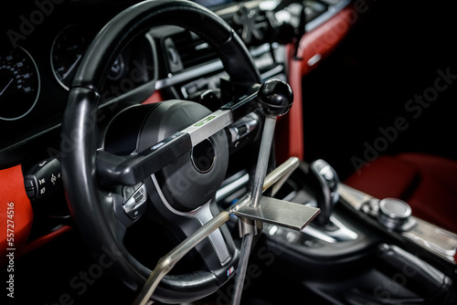 Steering wheel balancing in service center. Special professional equipment for wheel alignment © thomsond