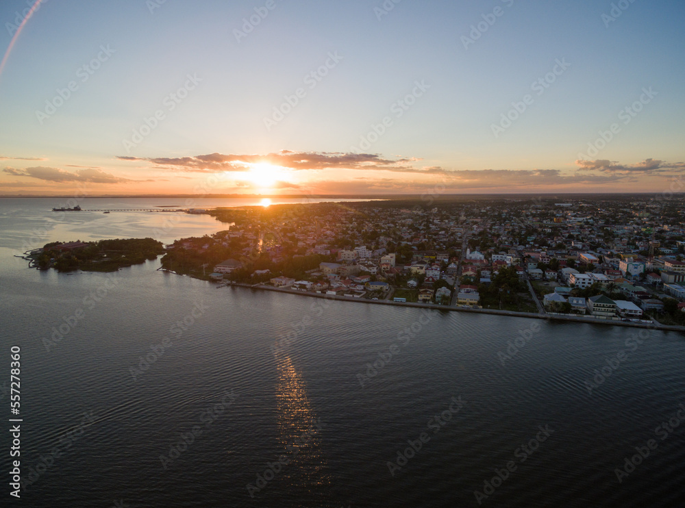 Caribbean Sea and Belize Cityscape with Sunset Light