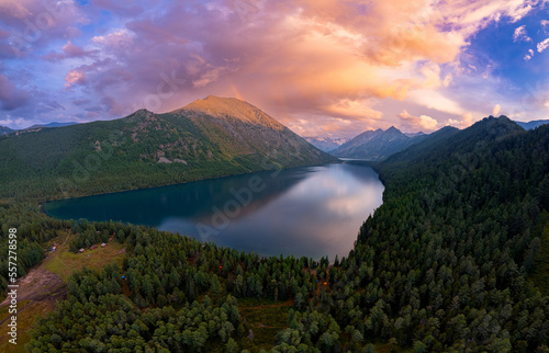 Night landscape Multe lake in mountains Altai on summer day sunset, aerial top view