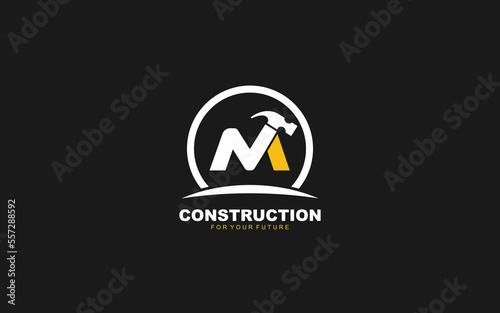 M logo construction vector for woodworking company. initial letter hammer template vector illustration for your brand.