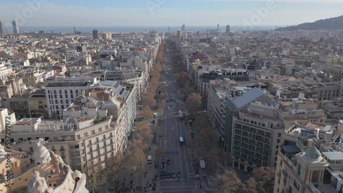 flying backward over Paseo de Gracia in Barcelona Spain