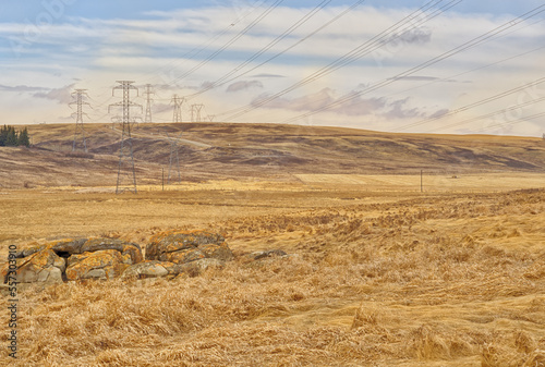 Landscape of the prairie foothills with High Voltage towers.