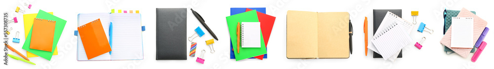 Set of stylish notebooks with stationery on white background