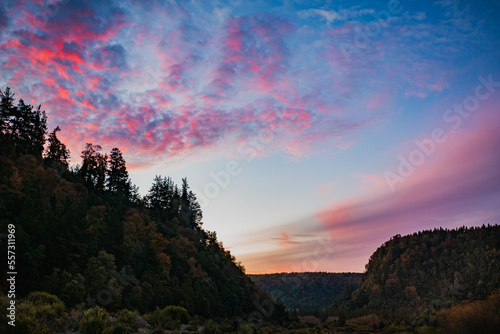 Landscape sunset colors over mountains and hills