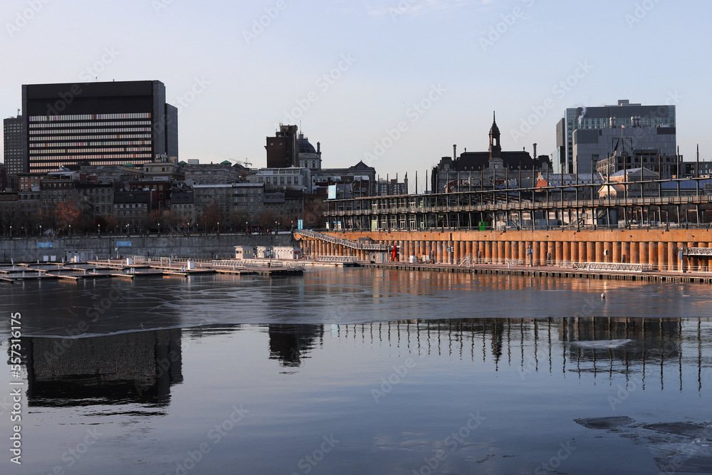 Streets of Montreal in winter. The historical part of the city downtown from old port, harbourfront panorama.
