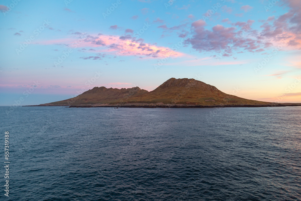 Sunrise over the remote Steeple Jason Island in the Falkland Islands. Sunrise over the remote Steeple Jason Island in the Falkland Islands.