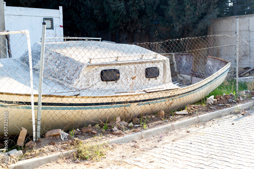 Fototapeta Naklejka Na Ścianę i Meble -  old yacht on the street in city 