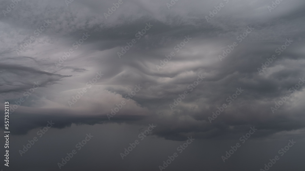 Obraz premium Detail shot of epic storm clouds during sunrise