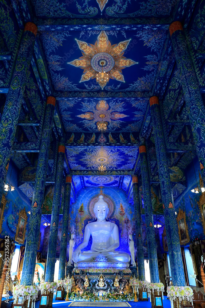 Fototapeta premium Wat Rong Suea Ten, Temple of the Dancing Tiger,white statue of buddha, in the blue buddhist temple -Chiang Rai-Thailand