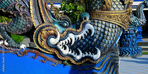 Detail of dragon in Wat Rong Suea Ten, Temple of the Dancing Tiger, in the blue buddhist temple -Chiang Rai-Thailand
