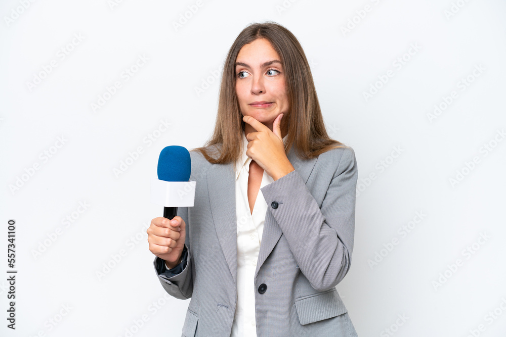 Young TV presenter caucasian woman isolated on white background having doubts and thinking Young TV presenter caucasian woman isolated on white background having doubts and thinking