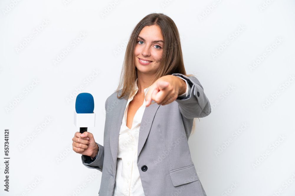 Young TV presenter caucasian woman isolated on white background pointing front with happy expression Young TV presenter caucasian woman isolated on white background pointing front with happy expression