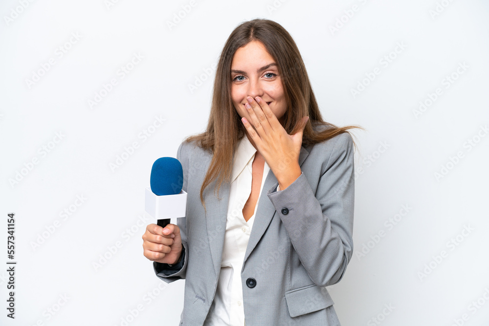 Young TV presenter caucasian woman isolated on white background happy and smiling covering mouth with hand Young TV presenter caucasian woman isolated on white background happy and smiling covering mouth with hand