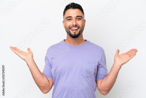 Young Arab handsome man isolated on white background with shocked facial expression