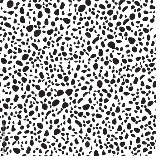 Seamless animal pattern for textile design. Seamless background from Dalmatian spots
