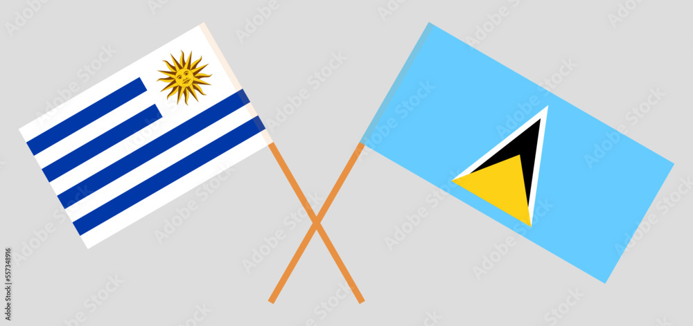 Crossed flags of Uruguay and Saint Lucia. Official colors. Correct proportion