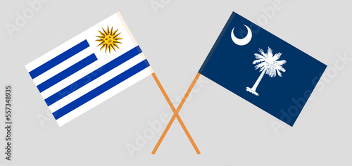 Crossed flags of Uruguay and The State of South Carolina. Official colors. Correct proportion