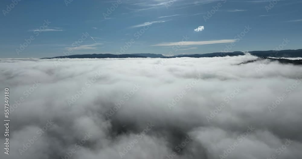 Drone flight over the clouds during sunrise. Fly through the clouds. Fresh morning and amazing sun rays over cloudscape. Drone flight over the clouds during sunrise. Fly through the clouds. Fresh morning and amazing sun rays over cloudscape.