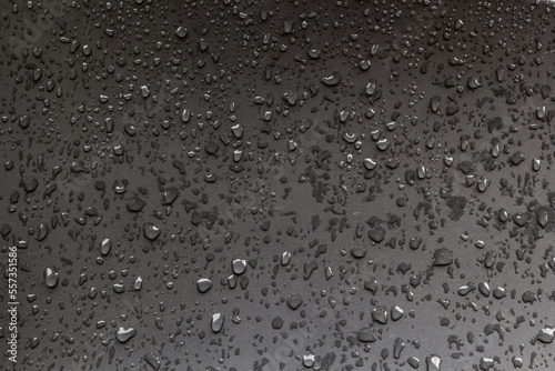 abstract background drops of rain water on a wooden table