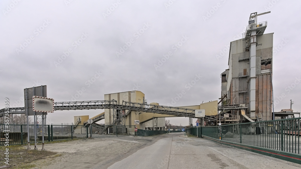Fototapeta premium Silo`s and conveyor belts of a stone quarry in LEssines, Wallonia, Belgium 