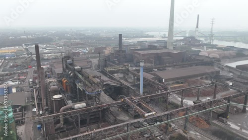 Blast furnice and industrial recycling company. Sintering, zinc production, furnace and casting. Steel industry factory plant. Aerial drone overhead view. Heavy industry in Germany. photo