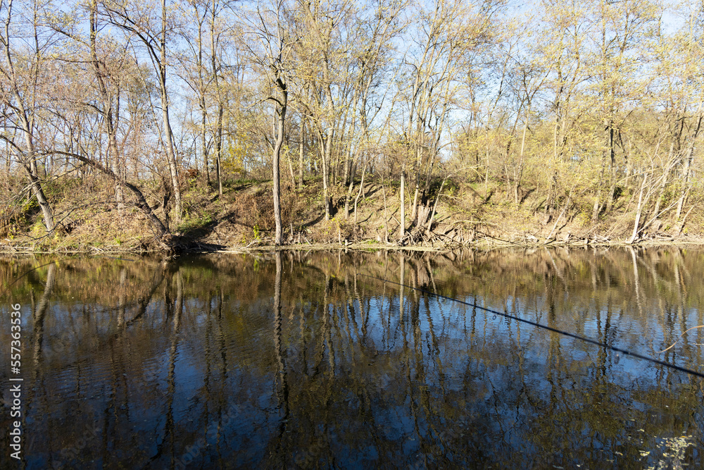 Autumn landscape with a river and trees. Autumn landscape with a river and trees.