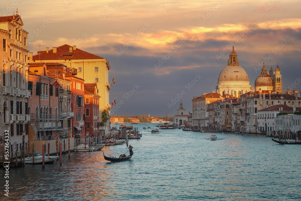 Sunset on the famous Canal Grande with the Basilica of Santa Maria della Salute in the background, Venice, Italy