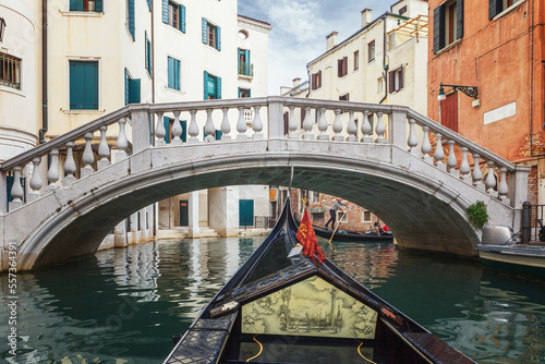 gondolas passing the Maria Callas bridge, Venice, Italy