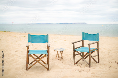Chairs on a beach. Dorset coast with view of Isle of Wight  UK