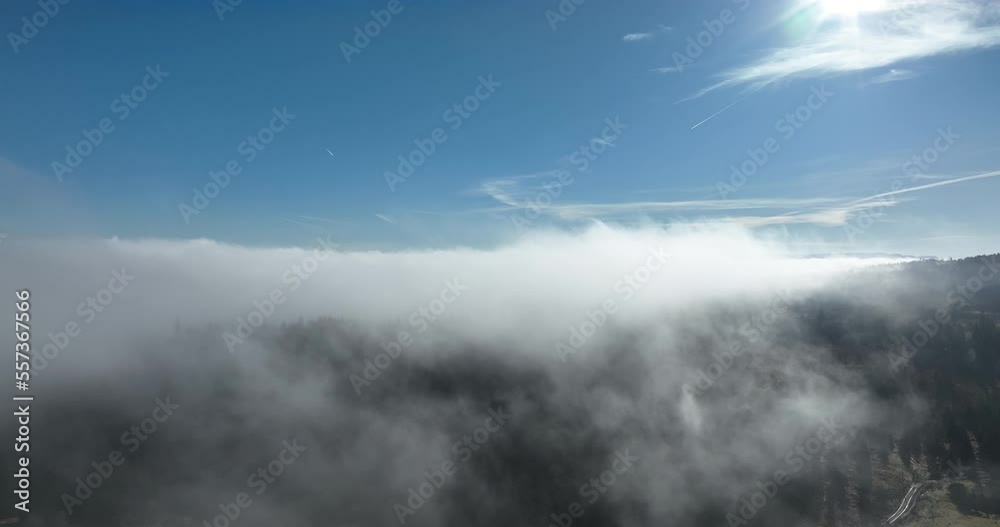 Drone flight over the clouds during sunrise. Fly through the clouds. Fresh morning and amazing sun rays over cloudscape. Drone flight over the clouds during sunrise. Fly through the clouds. Fresh morning and amazing sun rays over cloudscape.