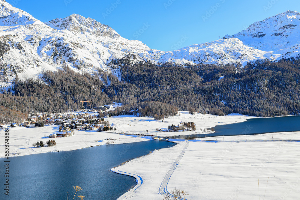 Silvaplana lake in winter from high view to Piz Corvatsch in Engadine in Switzerland