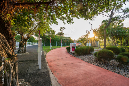 Taichung City, Taiwan - November 28, 2022 : Sunset time in Taichung Central Park. Xitun District Shuinan Economic and Trade Area. photo