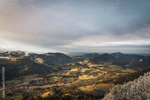 Scenic mountain panorama in autumn during golden hour in birds eye perspective