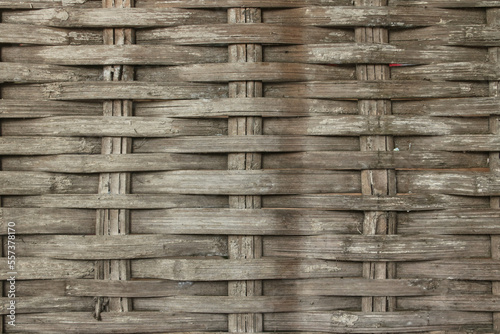 a rustic wall made from woven bamboo