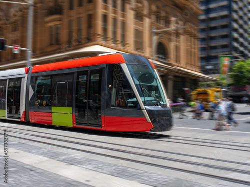 Tram moving through George in CBD Sydney NSW Australia