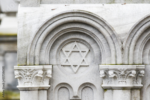 Star of David on a tombstone in a Jewish cemetery. photo