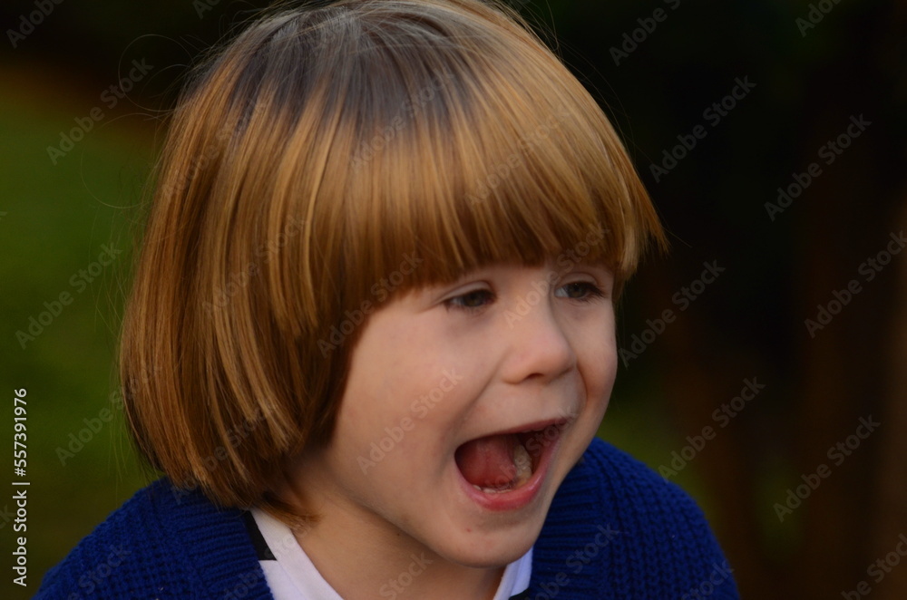 Portrait of a cute boy. 3 years. Positive child, close-up face